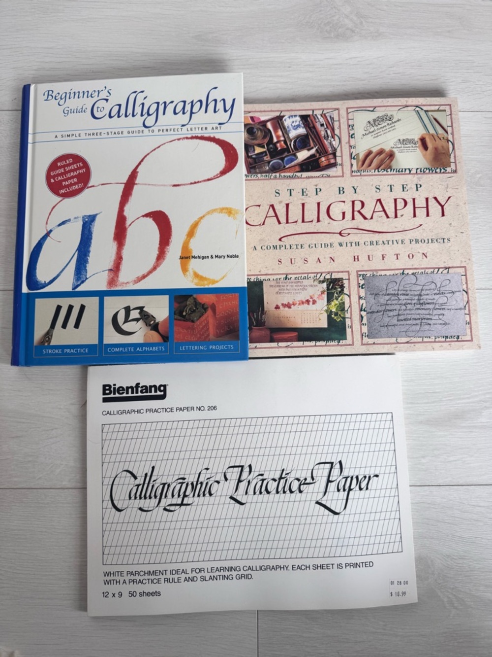 Vintage calligraphy, guide books and practice paper
